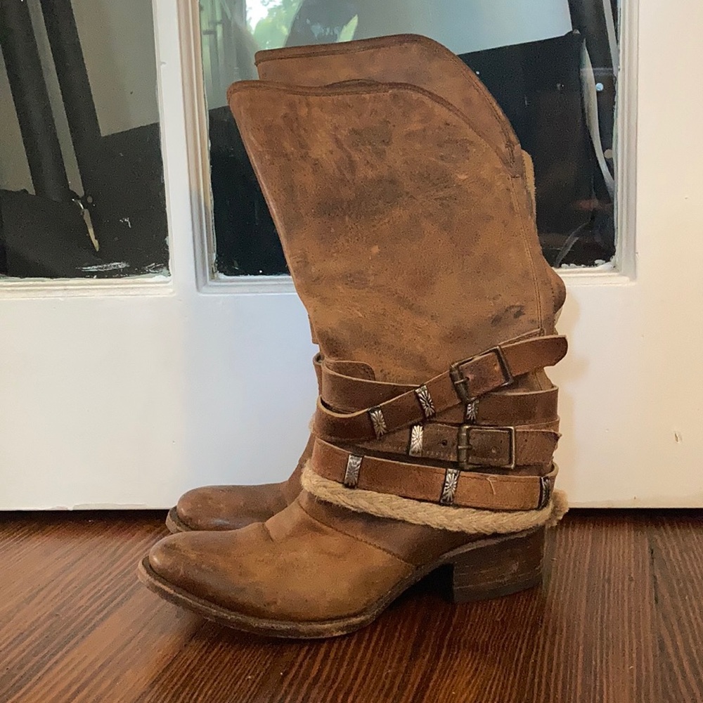 Knee high brown leather western style boots